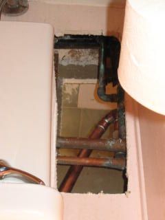 Leak repair access opening